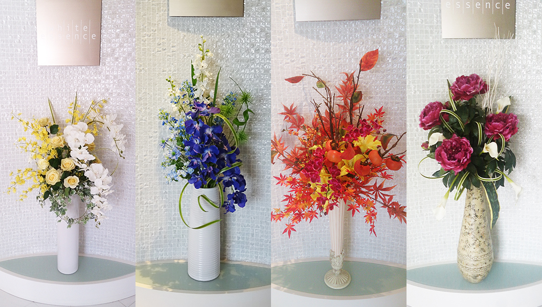 クリニックのエントランスに飾られた季節毎の造花アレンジメント